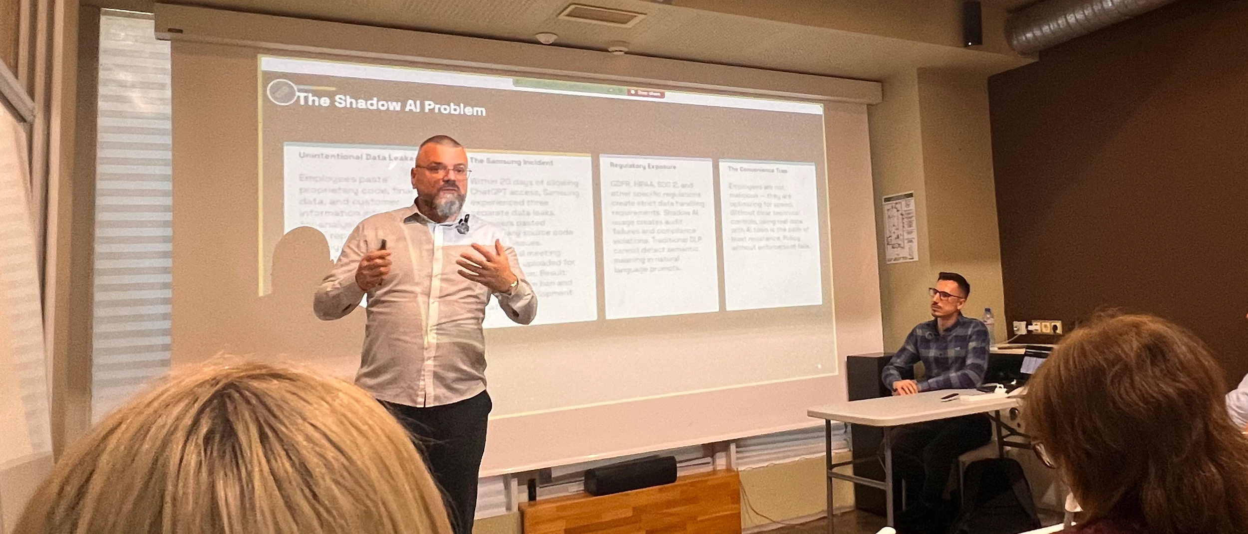 Stihia presenter covering the shadow AI problem in front of a workshop audience